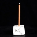 Natural white crystal incense burner cube with dark brown incense stick for meditation - Howlite