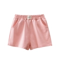 Pink girl's cotton sports shorts with elastic waist and white decorative label - Pink / 90cm