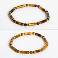 Tiger eye stone bead bracelet featuring cylindrical beads and golden metallic accents - Tiger Eye - Gold Spacers