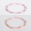 Pink crystal bead bracelet with gold and silver accents on white background - Rose Quartz - Gold Spacers