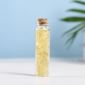 Natural yellow citrine crystal chips in a clear glass bottle with a cork stopper - 5-7mm Chips / Citrine