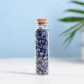 Natural blue lapis lazuli crystal chips in a tall glass bottle with a cork stopper - Lapis Lazuli (5-7mm)
