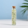 Natural prehnite crystal chips in a clear glass bottle with a rustic cork stopper - Prehnite (5-7mm)