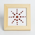 Square wooden frame with sunburst pattern of red jasper stones for home decor - Red Jasper