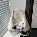 Borsa tote in velluto a coste bianco crema con ricamo cane e tracolla regolabile - Bianco
