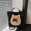 Schwarze Cord-Tragetasche mit großem beigem Katzen-Patch-Stickerei und Ledergriffen - Schwarz