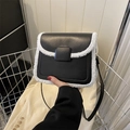 Fashionable black leather square bag with white faux fur trim and shoulder strap - Black