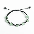 Adjustable black braided bracelet with seven light green aventurine stones and bead accents - Green Aventurine