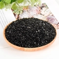 Polished black obsidian crystal stones in a round wooden tray for home aromatherapy - Obsidian / 3-5mm / 300g