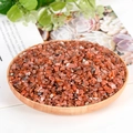 Polished reddish-brown natural crystal stones in a round wooden tray for decor - Southern Red Agate / 5-7mm / 300g