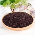 Natural red garnet sand gemstones displayed in a round wooden bowl with organic vibes - Garnet / 3-5mm / 300g