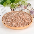 Natural orange sunstone crystals tumbled stones displayed in a wooden tray - Rutilated Quartz / 3-5mm / 300g