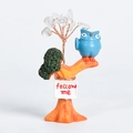 Blue owl crystal tree ornament with orange branch and green base on white background - Blue Owl - Clear Quartz
