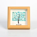 Square wood frame with blue polished crystal stone tree art and Blossom text detail - Amazonite