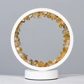 Modern white ring table lamp with natural yellow citrine crystals on a grey background - Citrine Geode - Round Style