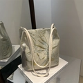 Off-white tote bag with green bamboo embroidery and elegant grey tassel charm - Bamboo Leaf White