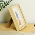 Wooden frame with seven natural chakra stones and mandala art for healing decor - Multicolor Yoga Luminous Style