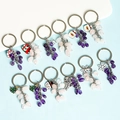 Natural crystal stone Christmas keychains with Santa Claus and snowflake enamel charms - Santa Face Circle / Christmas Grape Style - Purple
