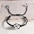 Adjustable black woven rope bracelet featuring a natural white crystal stone pendant - White Crystal