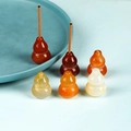 Translucent gourd-shaped agate incense holders set on a refreshing light blue background - Gourd Style