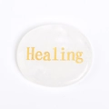 Ovale witte natuursteen met gouden Healing tekst voor ontspanning en massage - Witte Kristal: Genezing