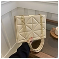 Beige quilted tote bag with golden chain straps and geometric diamond pattern finish - Off White