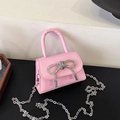 Pink mini handbag with rhinestone bow, fine grain leather texture and chain strap - Pink