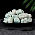 Polished K2 Jasper tumbled stones with blue spots in a black decorative bowl - Phoenix Stone 2-3cm 100g