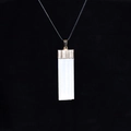 Minimalist white selenite crystal rectangle pendant with gold textured cap and black cord - Selenite Gold Plated