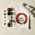 Zodiac crystal healing set with red agate bracelet and natural stones on ivory background - Scorpio New Style