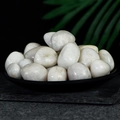 Polished white natural crystal stones in a black tray for healing and home decoration - White Moonlight 2-3cm 100g
