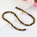 Perles rondes en œil de tigre naturel 6mm pour bijoux DIY avec texture effet œil de chat - Œil de tigre