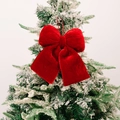 Large red velvet Christmas bow hanging on a snow-covered tree for festive decoration - Medium / Burgundy