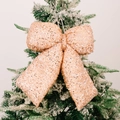 Christmas tree bow ornament in rose gold sequins with hanging rope on snowy branches - Large Champagne