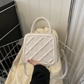 Elegant off-white quilted square handbag with gold hardware and versatile crossbody strap - White