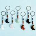 Set of moon-shaped keychains with natural crystal pendants and seven chakra beads - Seven Chakra Moon Style / Rose Quartz