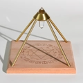 Clear quartz crystal pyramid generator with golden metal stand and carved wooden base - Mayan Totem / Small