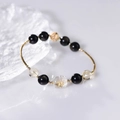 Golden sheen obsidian 12mm bead bracelet with rutilated quartz PiXiu charm for couples - Female Style