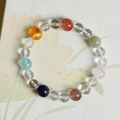 Natural 8mm clear quartz bracelet with multi-color gemstone beads on artistic background - Single Loop Multi-color Bracelet