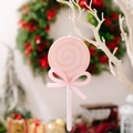 Lecca-lecca natalizio rosa e bianco con glitter e fiocco appeso a un ramo di albero - Rosa