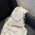 Cream daisy embroidery woven crossbody bag with straw splicing and flap closure - Off White