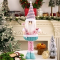 Pink telescopic Christmas gnome doll with tall knitted hat holding a candy cane - Pink and Blue Series Telescopic Christmas Gnome Doll (Santa)