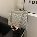 Silver quilted lattice crossbody bag with gold chain strap and spacious metallic finish - Silver