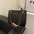 Chic black quilted chain crossbody bag with golden logo and metal strap for women - Black