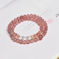 Dubbellaagse armband van aardbeienkristal met kroonbedeltje en heldere kralen - Aardbeienkwarts Dubbele Armband