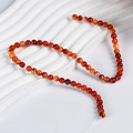 Perles rondes en agate rouge 6mm polies avec veines naturelles pour création bijoux - Agate rouge