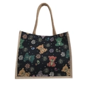 Canvas tote bag with black woven cartoon bear pattern and brown linen strap trim - Black