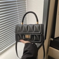 Classic black quilted crossbody bag with woven handle and gold clasp for women - Black