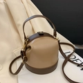 Chic two-tone leather bucket bag in beige and dark brown with golden metal hardware - Khaki