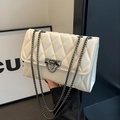 Elegant white quilted leather crossbody bag with black chain and metal clasp closure - Off-white